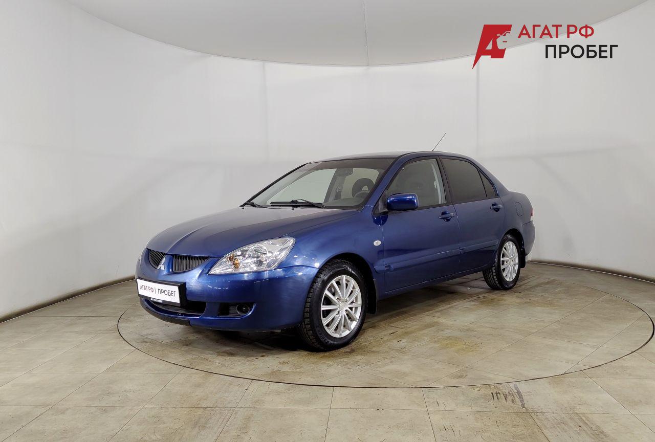 Mitsubishi Lancer — фото 1