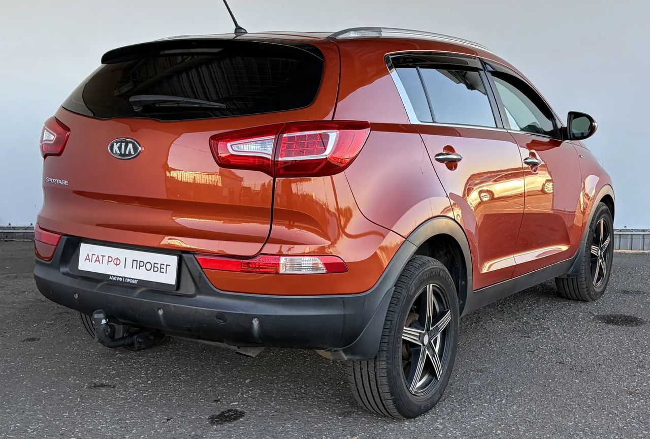 Kia Sportage — фото 5