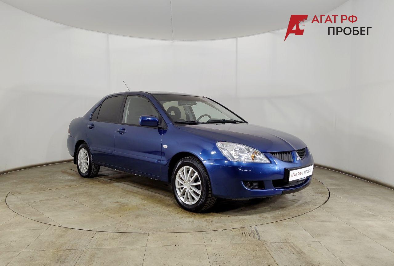 Mitsubishi Lancer — фото 3