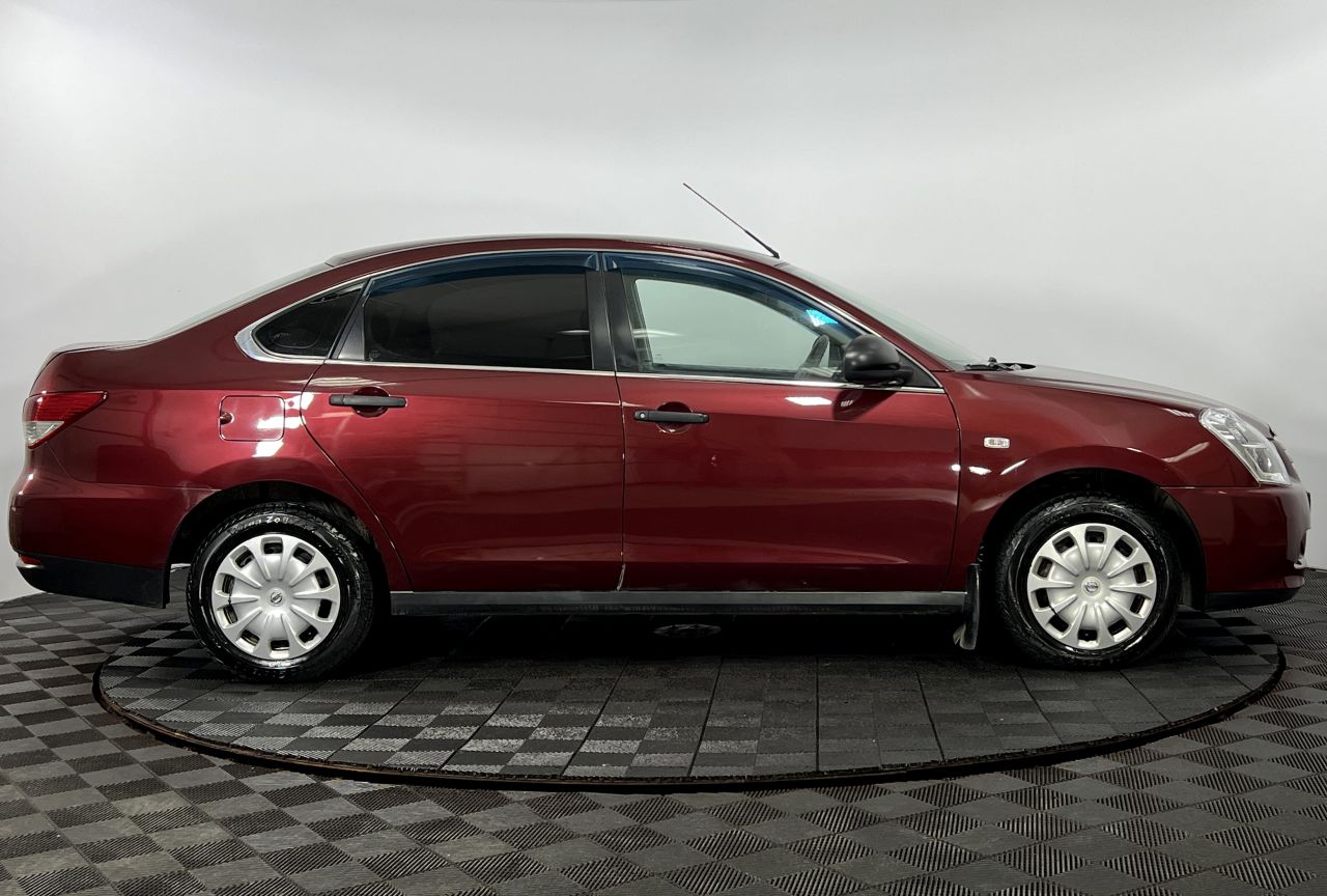 Nissan Almera — фото 5