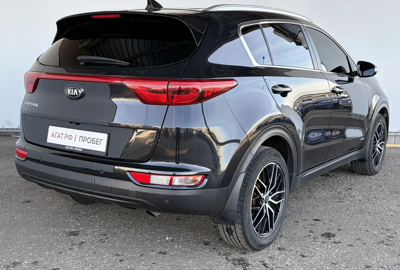 Kia Sportage — фото 5