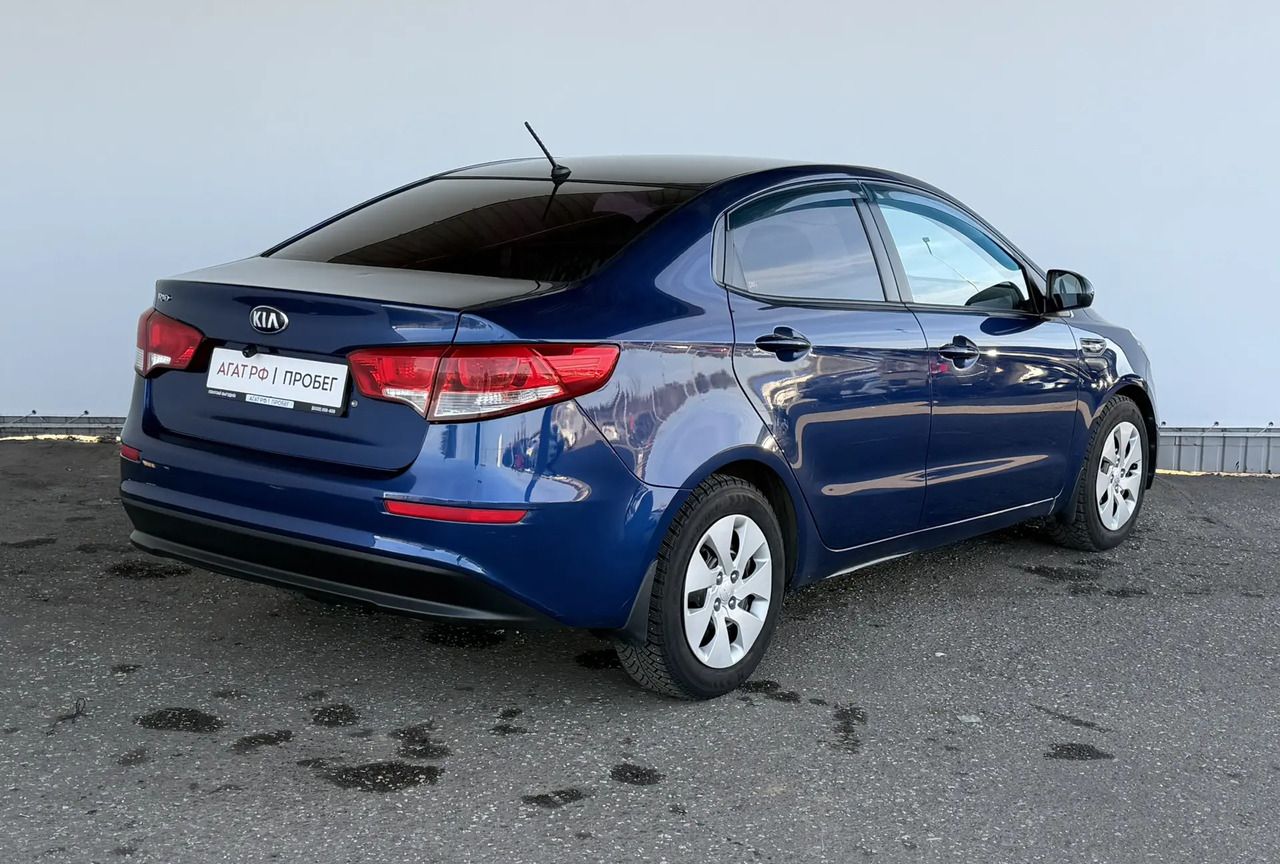 Kia Rio — фото 5