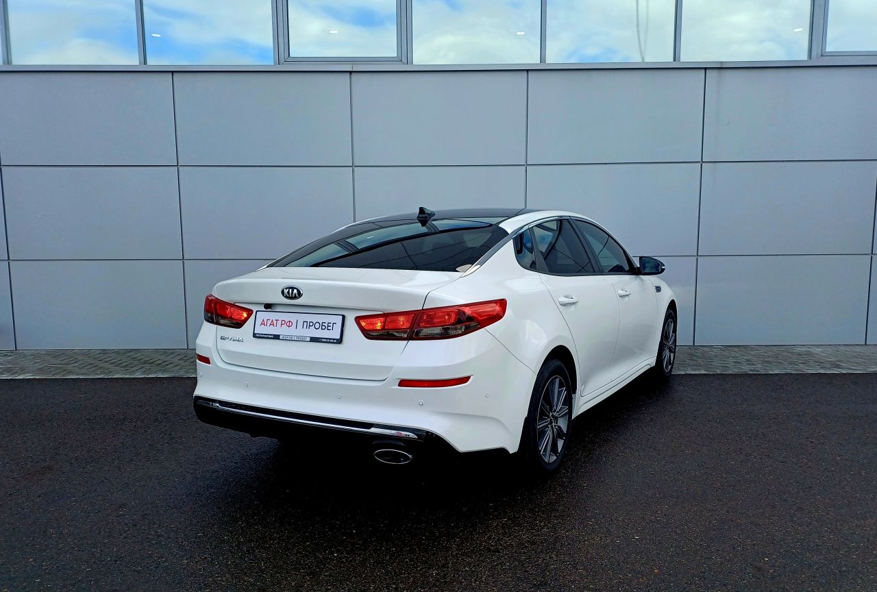 Kia Optima — фото 5