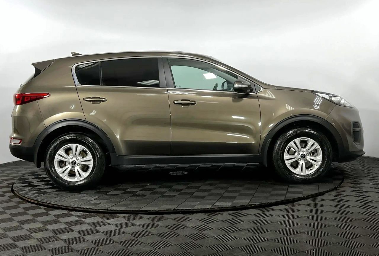 Kia Sportage — фото 5