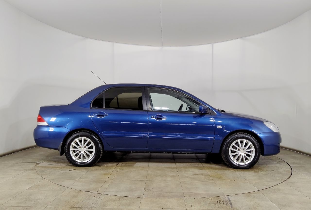Mitsubishi Lancer — фото 4
