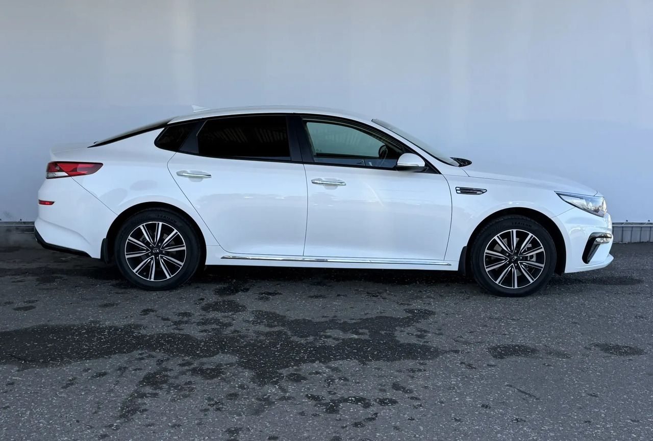 Kia Optima — фото 4