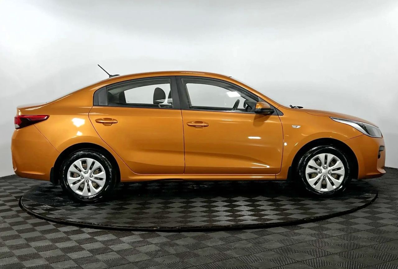 Kia Rio — фото 5