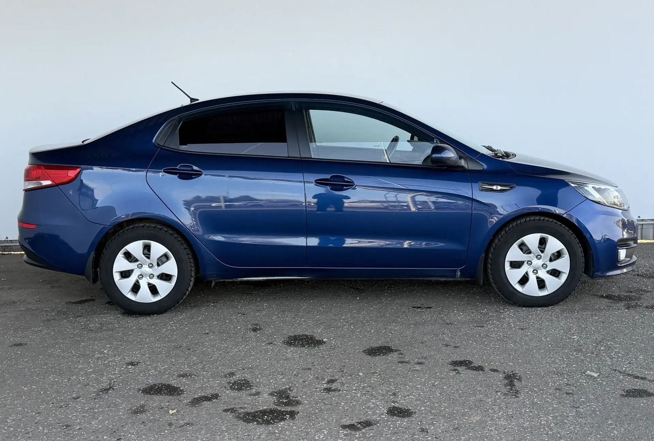 Kia Rio — фото 4
